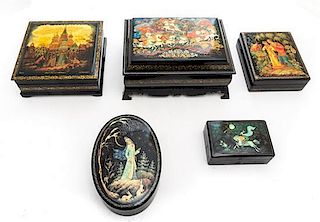 * A Group of Five Kholui School Russian Lacquer Boxes Height of largest 3 1/8 x width 7 3/8 x depth 5 1/2 inches.
