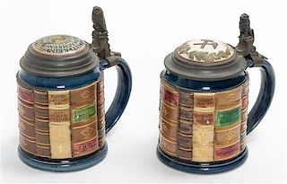 * A Pair of Mettlach Pewter Mounted Steins Height 6 3/4 inches.