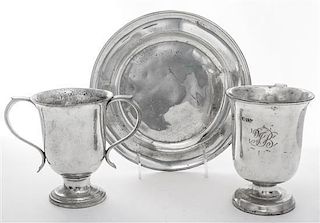* A Collection of Three Pewter Articles Diameter of dish 9 inches.