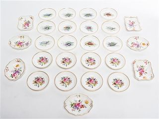* A Collection of Boxed English Porcelain Saucers Average diameter 3 1/4 inches.