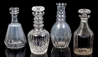 Four English Cut Glass Decanters Height of tallest 9 1/4 inches.
