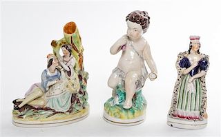 * Three Staffordshire Pottery Figures Height of tallest 9 3/4 inches.
