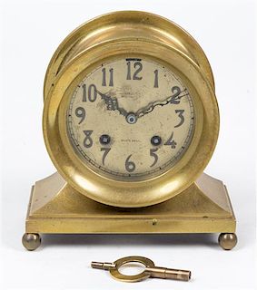 * A Brass Chelsea Ship's Bell Clock Height 7 inches.