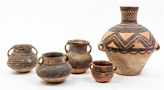 * A Group of Nine Neolithic Style Pottery Vessels Height of tallest 12 inches.