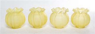 A Set of Four Yellow Glass Shades Height 5 inches.