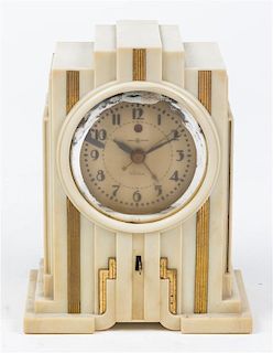 * An Art Deco Composite Table Clock Height 7 1/2 inches.