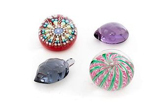 * A Collection of Glass Paperweights Diameter of largest 2 3/4 inches.
