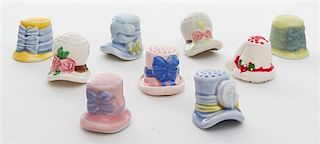 Nine Porcelain Thimbles Height of first 1 1/8 inches.