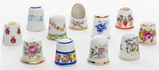A Group of Porcelain Thimbles Height of first 1 1/8 inches.