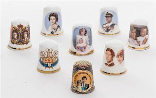 A Collection of Eight British Royal Family Commemorative Thimbles Height of tallest 1 1/8 inches.