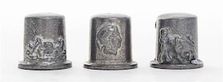 A Collection of Three Mixed Metal European Themed Thimbles Height 3/4 inches.