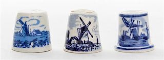 A Collection of Blue and White Porcelain Thimbles Height of tallest 3/4 inches.