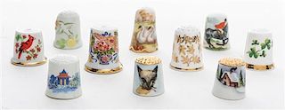 A Group of Porcelain Thimbles Height of first 1 inch.