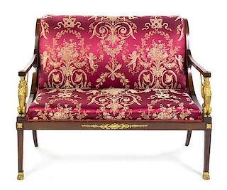 An Empire Style Gilt Bronze Mounted Mahogany Settee Width 44 1/2 inches.