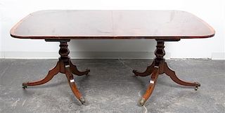 * A George III Style Mahogany Dining Table Width of top 72 inches.