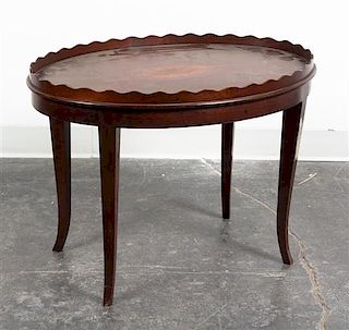 * An Oval Low Table Height 19 3/4 x width 26 3/4 x depth 19 1/4 inches.