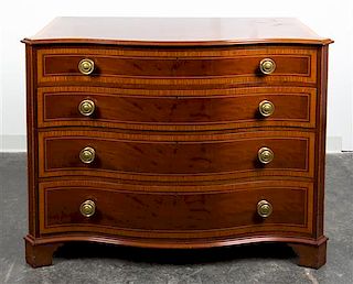* A Regency Style Inlaid Chest of Drawers Height 36 x width 46 x depth 22 1/2 inches.