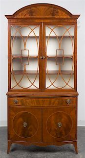 A Northern Furniture Company Mahogany China Cabinet Height of first 79 x width 38 x depth 18 1/2 inches.