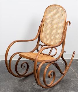 * A Thonet Style Bentwood Rocking Chair Height 40 3/4 inches.