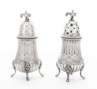 * Two German Silver Casters Height 5 inches.