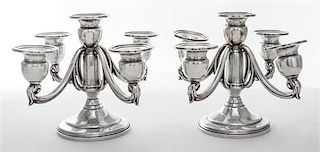 * A Pair of American Silver Five-Light Candelabra, Mueck-Carey Co., New York, NY, having a trumpet form base, the cups of balust
