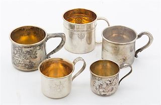 * A Collection of Silver Baby Cups Height of first 1 3/4 inches.