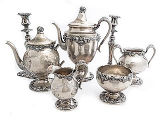 * An American Silver-plate Tea Set, K.S. & Co. Height of tallest 12 1/2 inches.
