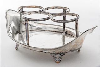 * A Sheffield-plate Cruet Set, Early 19th Century, of oval boat form with reeded rims and raised on conforming bracket supports,