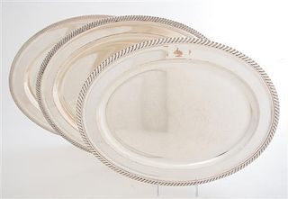 * A Collection of Five Silver-plate Trays, , four oval, one rectangular with handles, each with gadrooned edges.