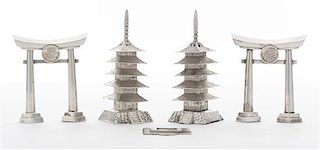 Four Japanese Style Silver Castors, , comprising two examples in the form of a torii gate and two examples in the form of a pago