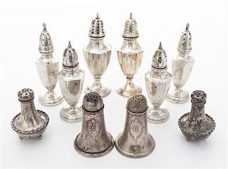 * A Collection of American Silver Casters Height of tallest pair 5 1/4 inches.