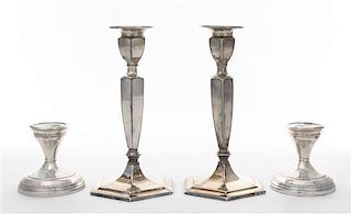 * A Pair of American Silver Candlesticks, 20th Century, with banded footrim and collar, together with a silver-plate pair of can