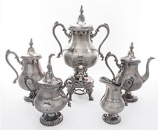 * A Meriden Brittania Silver-plate Tea and Coffee Set Height of tallest 18 1/4 inches.