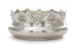 * An American Silver Bowl, Woodside Sterling Co., New York, NY, 20th Century, of circular form with pierced rocaille decorated u