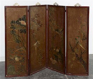 A Chinese Lacquered Four-Panel Screen Height 50 x width of each panel 15 3/4 inches.