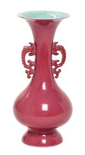 A Ruby Red Glazed Porcelain Vase Height 7 inches.