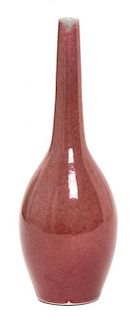 A Peach-Bloom Glazed Porcelain Bottle Vase Height 8 1/2 inches.