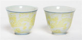 A Pair of Yellow Glazed Decorated Porcelain Wine Cups Diameter 2 1/4 inches.