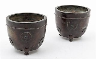 A Pair of Bronze Tripod Censers Height 4 1/2 inches.