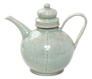 A Qingbai Porcelain Wine Ewer Height 7 1/2 inches.