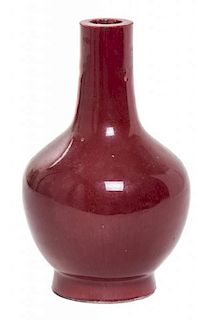 A Small Sang-de-Boeuf Glazed Porcelain Bottle Vase Height 4 3/4 inches.