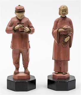 A Pair of Tin Figures Height 9 inches.