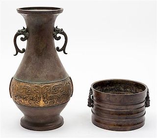 Two Bronze Articles Height 12 inches.