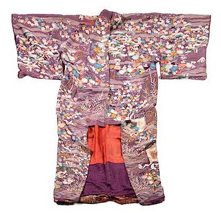 A Japanese Embroidered Silk Kimono. Height 62 inches.