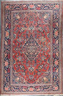 A Persian Wool Rug 6 feet 7 inches x 4 feet 4 inches.