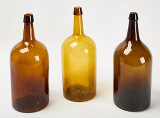 Three Amber Blown Glass Bottles