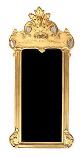 A Giltwood Rococo Style Mirror, Height 64 x width 31 1/2 inches.