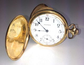 14k y.g. Waltham closed faced pocket watch with 17 jewels. Running. Arabic numerals, hours, minutes,
