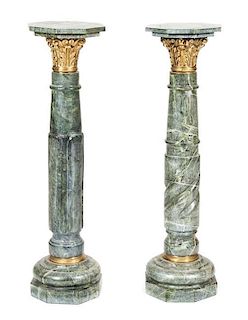 A Pair of Neoclassical Gilt Metal Mounted Verde Marble Pedestals, Height 48 inches.