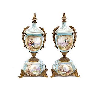 A Pair of Continental Sevres Style Porcelain and Gilt Metal Mounted Vases, Height 14 inches.